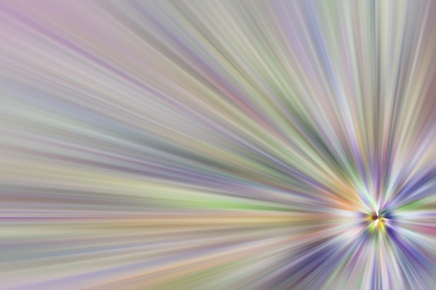 Multicolored abstract with radial blur centered at lower right, for decoration and backgrounds with motifs of origin, energy, convergence.jpeg